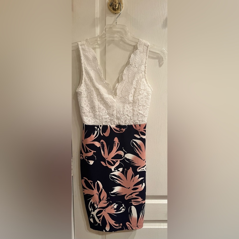 Cals dress size small. Worn once. Fits like a glove so comfortable.